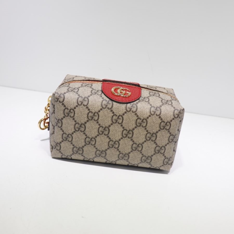 G*u*i clutch bags